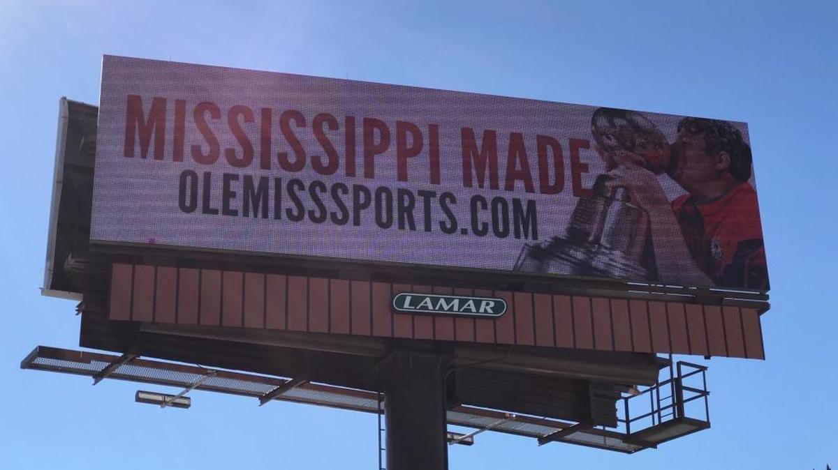 Ole Miss just unveiled a new advertising campaign with the tagline “Mississippi Made.” A billboard on U.S. 49 in downtown Gulfport features Coast native Matt Luke, the former Admiral who was recently given the head coaching job at Ole Miss.