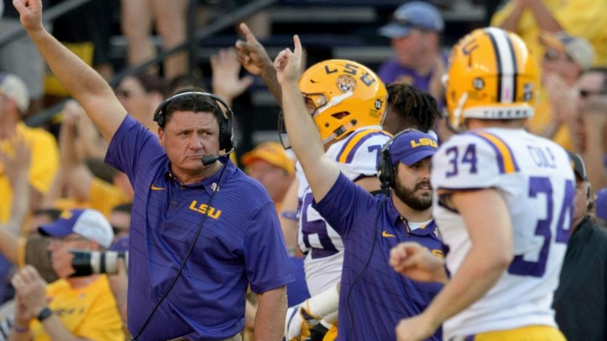 LSU head coach Ed Orgeron celebrates a touchdown in the second half against Auburn in an NCAA college football game in Baton Rouge, La., Saturday, Oct. 14, 2017.