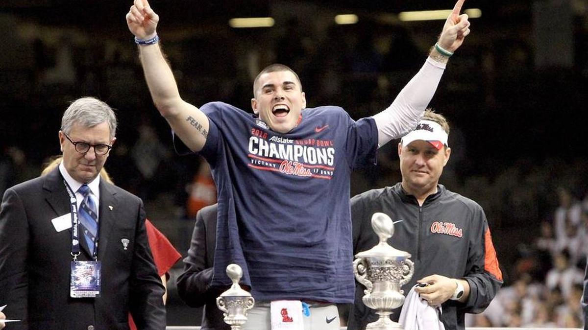 Ole Miss quarterback Chad Kelly celebrates Ole Miss’ win over Oklahoma State in the Sugar Bowl as Rebels coach Hugh Freeze looks on. Ole Miss will speak at SEC Media Day on Thursday.