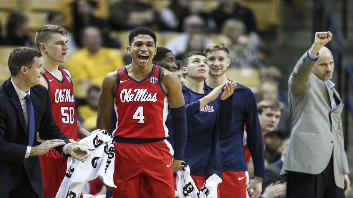 Ole Miss guard Breein Tyree (4) celebrates from the bench against Missouri, Saturday.