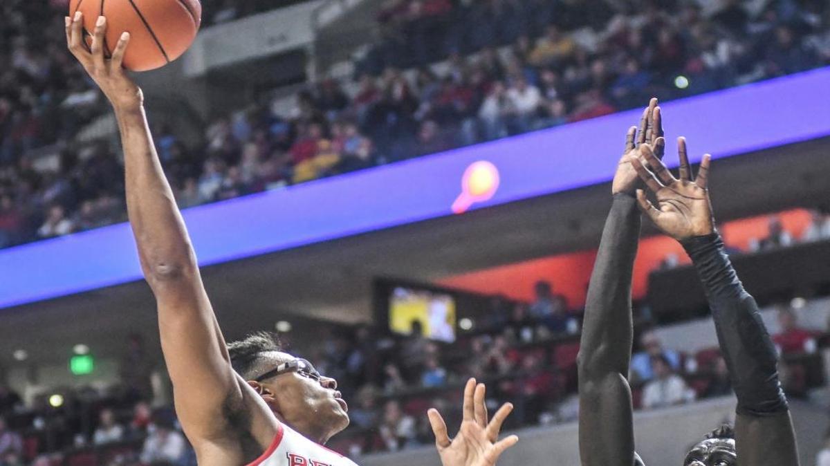Ole Miss forward Sebastian Saiz (11) shoots against Baylor forward Jo Lual-Acuil Jr. (0).