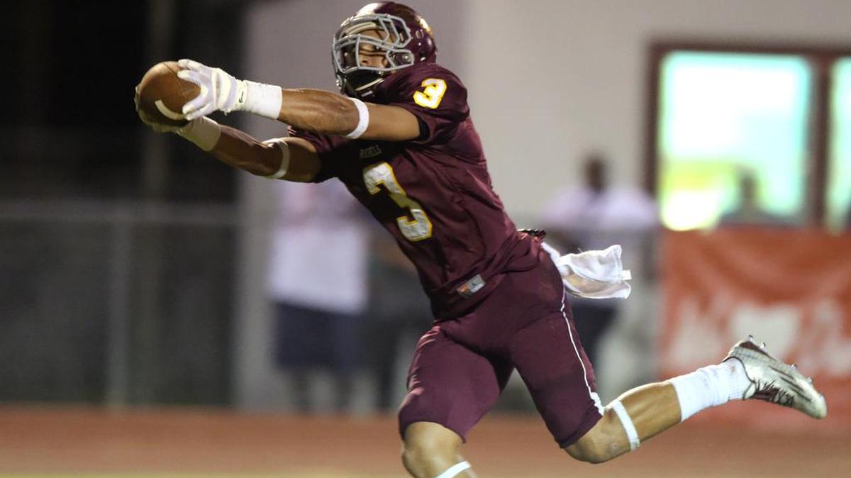 George County wide receiver Tyrese Fryfogle (3) pulls in a touchdown pass against Pascagoula on Sept. 11, 2015, at George County High School in Lucedale.
