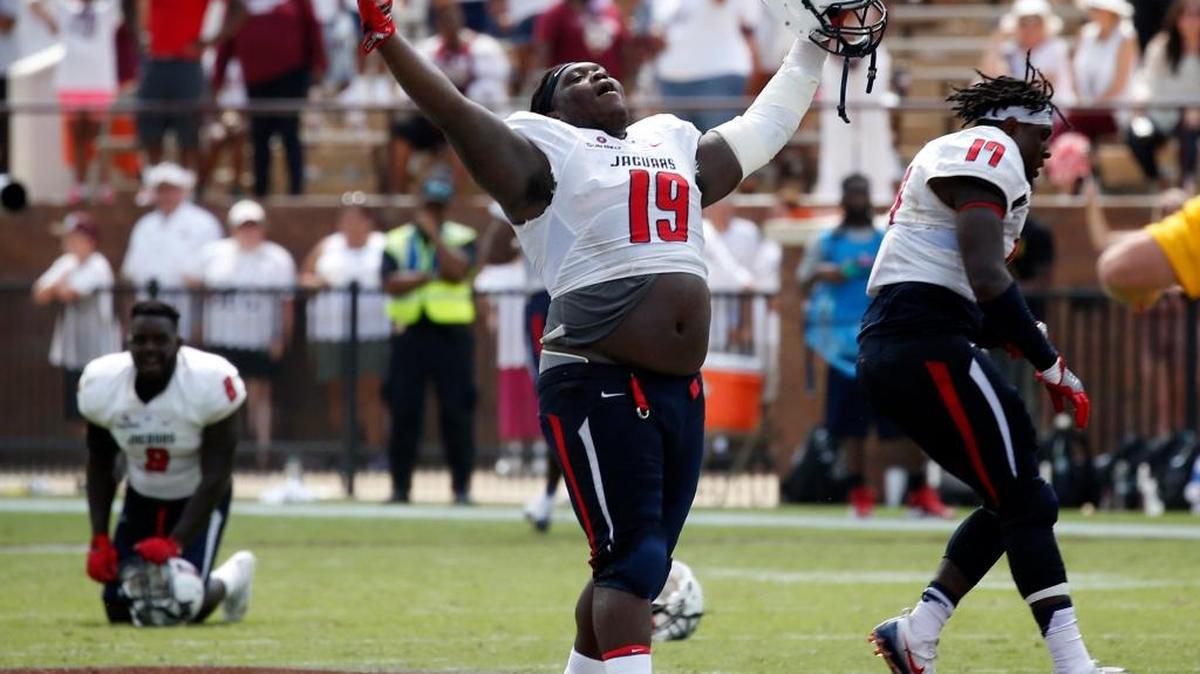 South Alabama defensive lineman Sir Calvin Wallace (19) celebrates their 21-20 win over Mississippi State in Starkville, Saturday, Sept. 3, 2016.