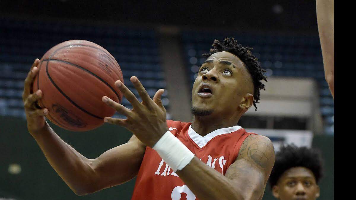 Biloxi's Martell Turner drives for a layup against Starkville in the 6A state quarterfinals
