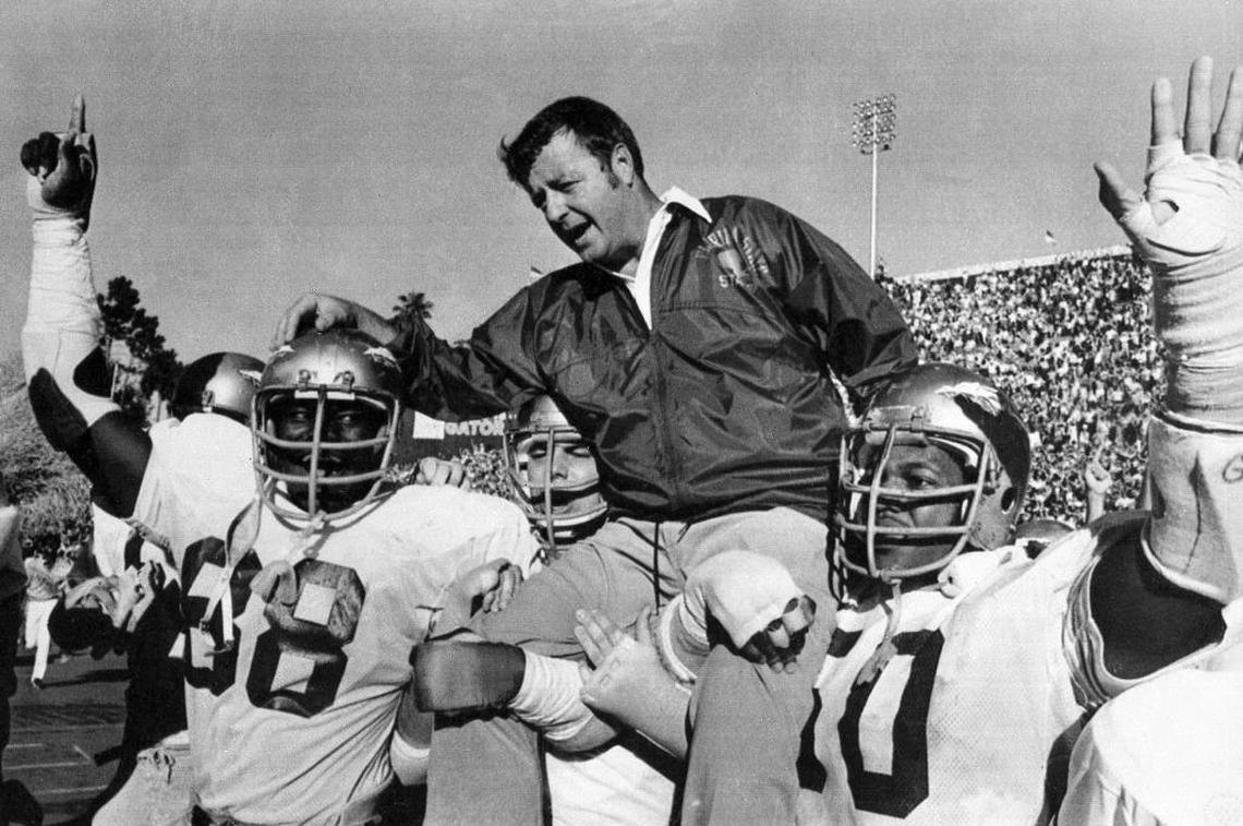 Former Florida State head coach Bobby Bowden is carried on the shoulders of defensive end Willie Jones (88) and nose guard Ron Simmons (50) after Florida State defeated Florida 37-9 in in 1977 in Gainesville, Fla. Bowden retired as the second winningest coach in major-college football behind Penn State’s Joe Paterno.