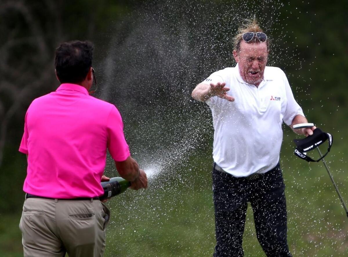 Miguel Jimenez successfully defended his Mississippi Gulf Resort Championship by winning another at Fallen Oak on April 2, 2017. A friend douses Jimenez with champagne after a playoff round against Gene Sauers.