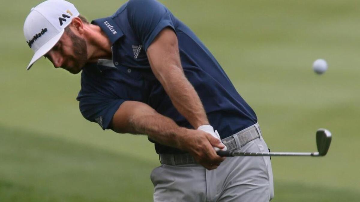 Dustin Johnson hits from the rough on the 17th hole on the final day of the Bridgestone Invitational golf tournament on Sunday, July 3, 2016, at Firestone Country Club in Akron, Ohio. Johnson won the tournament by one stroke.