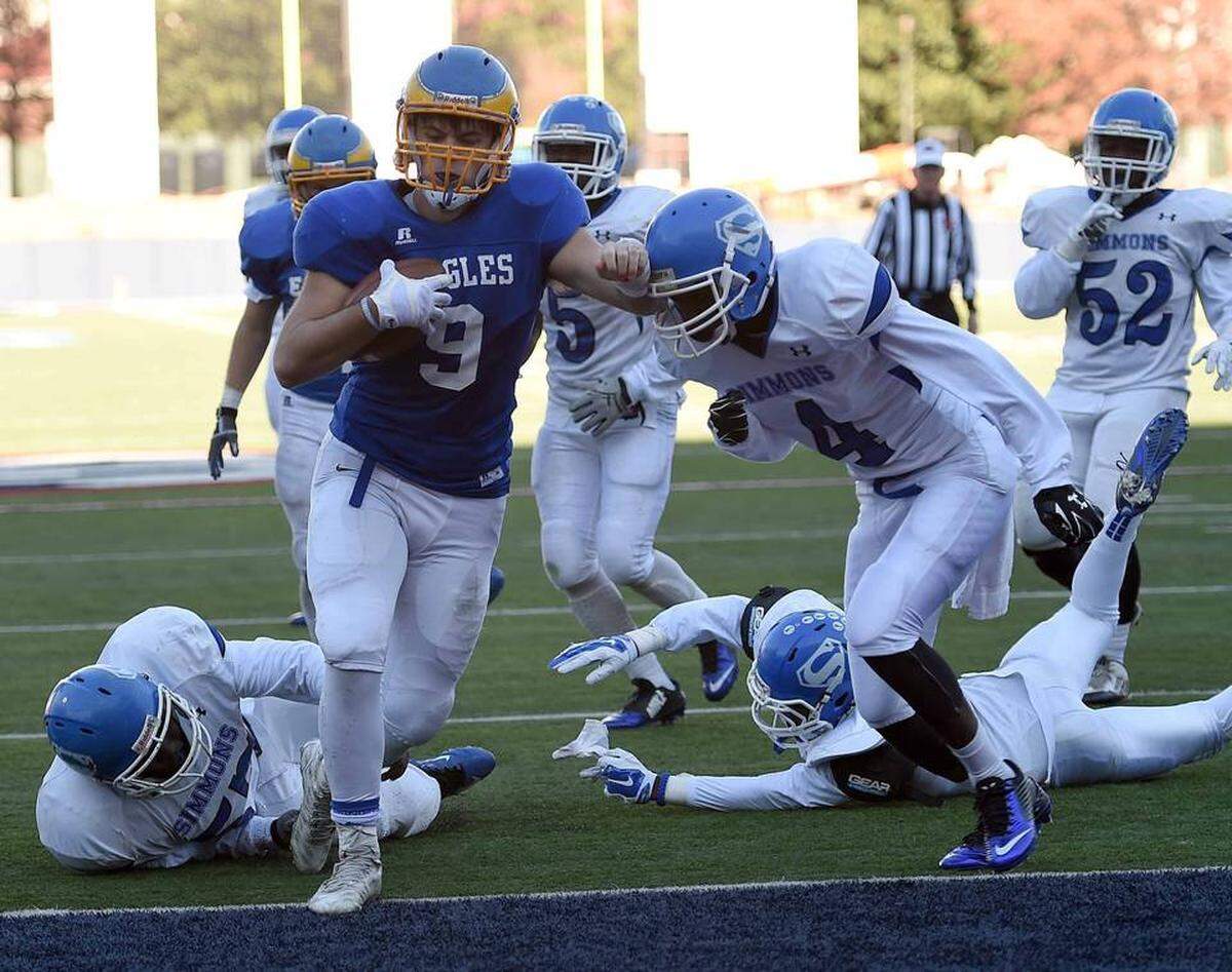 Resurrection RB Patrick Watts scores against Hollandale Simmons.