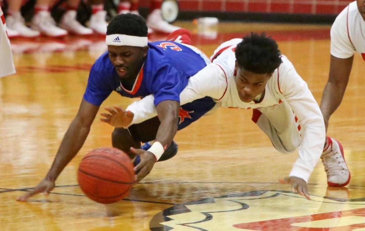 Biloxi’s D.Q. Probe and Gulfport’s Chad Crenshaw dive for a loose ball during the second quarter of their game at Biloxi High School on Feb. 10. Photographer’s comment: I feel like basketball photos tend to be redundant, so I like this shot because it’s not somebody driving to the basket.