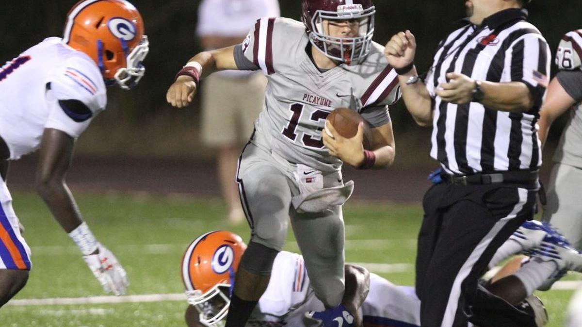 Picayune quarterback Skylar Bowman scrambles for a first down against Gulfport during the first half of their game at Picayune Memorial Stadium on Friday.