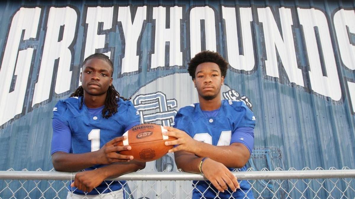Quarterback Malcom Magee, left, and running back Daveaunce Gaines, Ocean Springs High School football team.