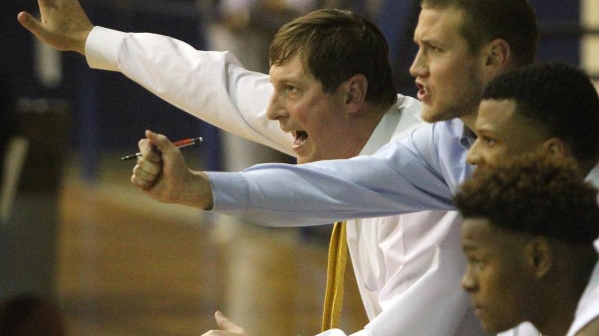 Bay head coach Randy McCrory, left, cheers on his team against Pascagoula at Bay High on Nov. 15 in Bay St. Louis.