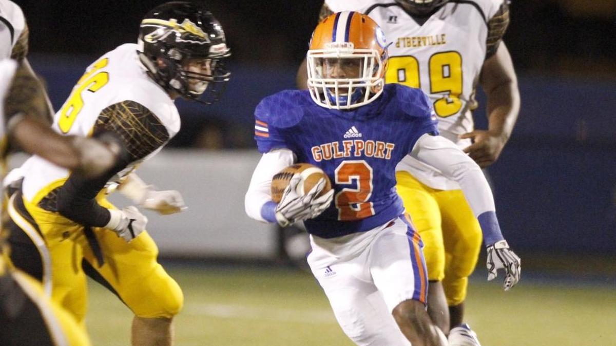 Gulfport's Jalen Knight gashes the D'Iberville defense for a long gain after catching a short pass at Milner Stadium, Friday Oct. 21, 2017.