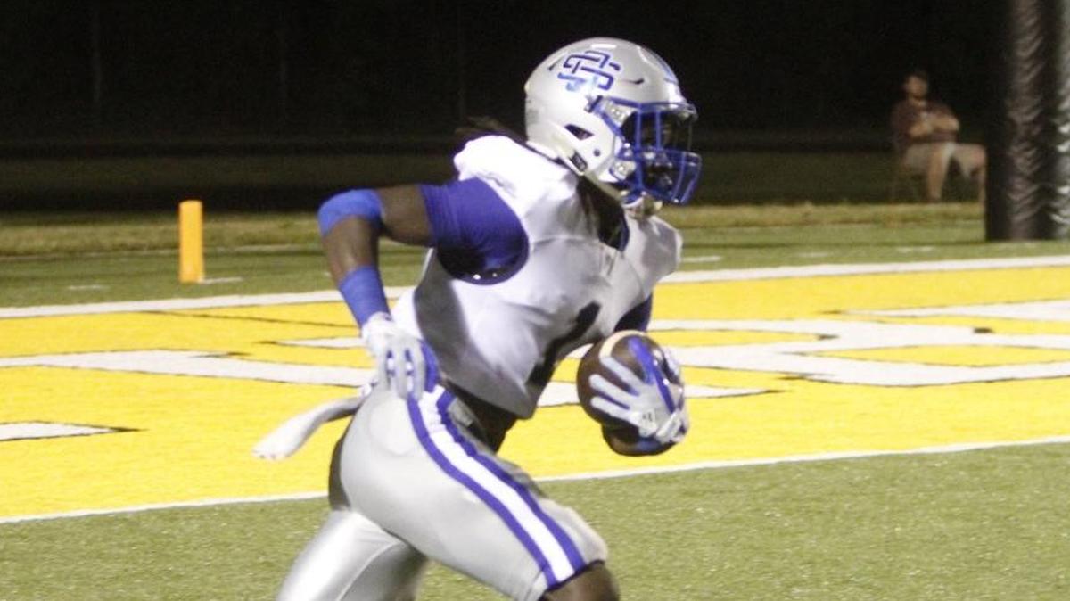 Ocean Springs's Malcolm Magee returns a kick during the third quarter of their game at Warrior Stadium in D'Iberville on Sept. 29, 2017.
