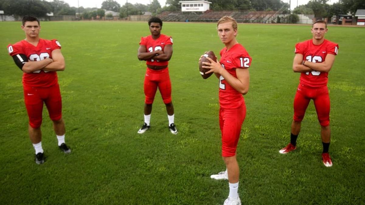 St. Stanislaus quarterback Myles Brennan stands with his offensive play makers Chase Rogers, left, Darius Pittman, center, and Corbin Blanchard. Brennan was contacted by LSU’s interim coaching staff Sunday night after head coach Les Miles was fired.