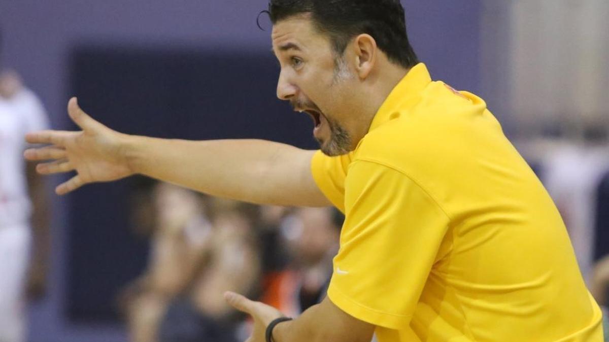 St. Martin head coach Charlie Pavlus yells instructions to his team during the fourth quarter of their Joe Barlow Thanksgiving Invitational basketball tournament game against McGill-Toolen on Tuesday, Nov. 22, 1016.