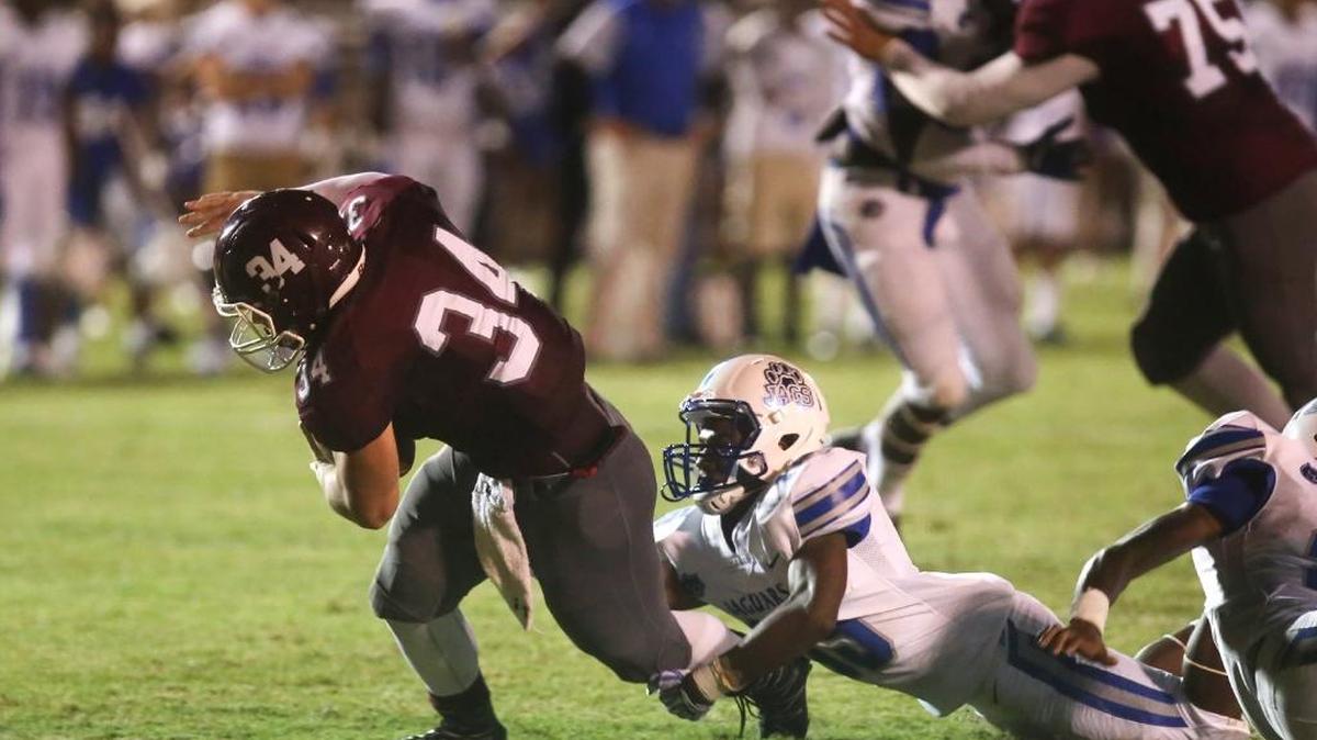East Central's Ryan Evans slips through the Jefferson Davis County defense into the end zone for a touchdown on Sept. 8 in Hurley.