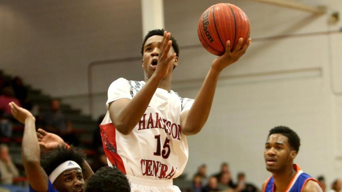 Harrison Central's Hamin Purdy jumps above the Gulfport defense while attempting a basket on Friday, January 5, 2018, at Harrison Central High School.