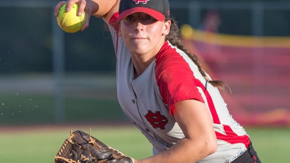 Harrison Central's Kristen Cade throws to first base against Tupelo during the MHSAA Softball Class 6A Championship series in Ridgeland on May 12