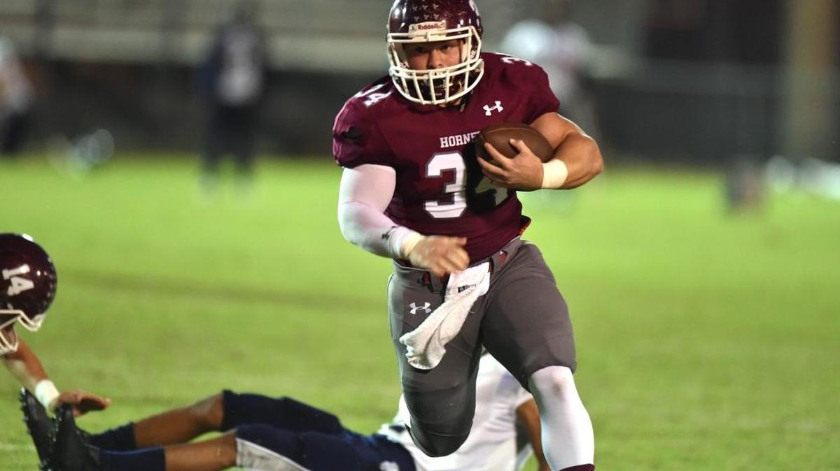 East Central running back Ryan Evans (34) runs the ball for a touchdown against Moss Point on Sept. 29, 2017, at East Central High School in Hurley.