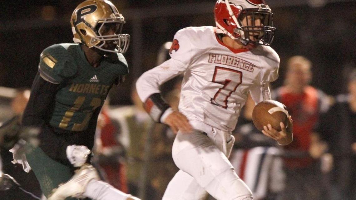 Poplarville’s D.J. Travis chases Florence quarterback Brad Dennis during their 4A South State title game in 2016. Travis recently popped up on the recruiting radar.