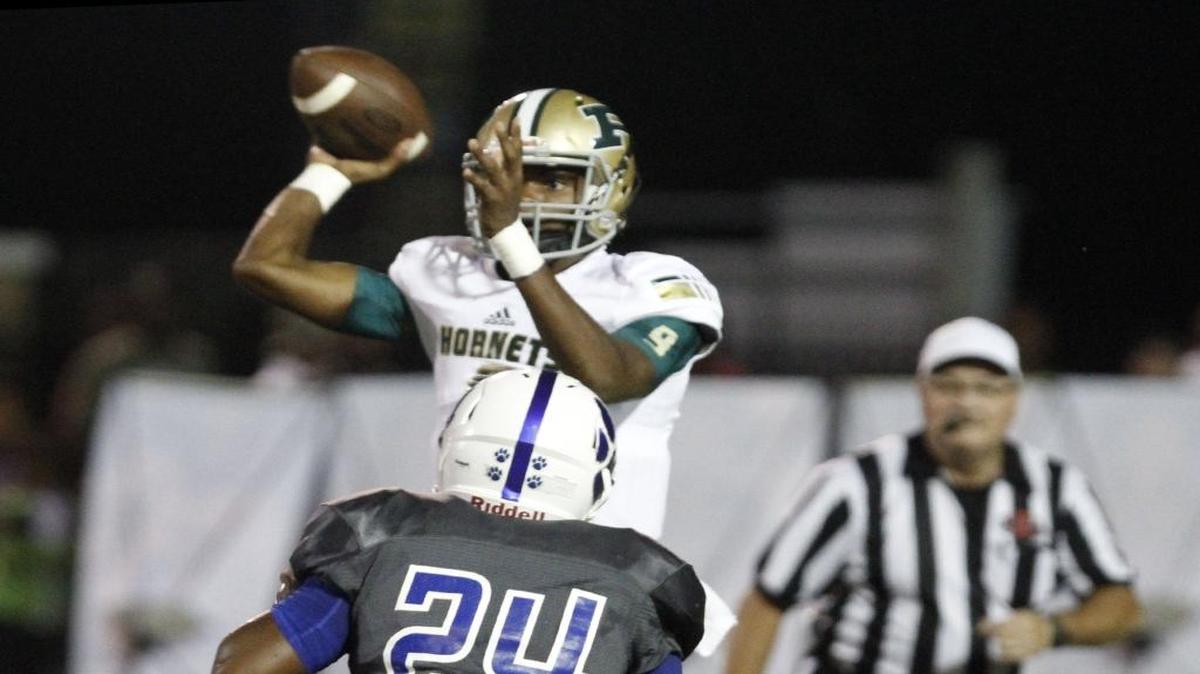 Poplarville quarterback Antonio Barnes throws against Stone during the second quarter of their game at A.L. May Stadium in Perkinston on Sept. 8.