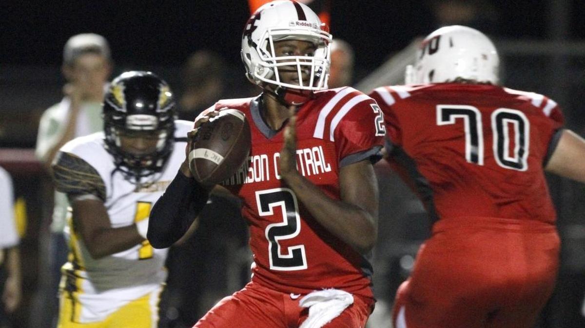 Harrison Central quarterback Tavis Williams looks for an open receiver against D'Iberville, Oct. 28, 2016 in Gulfport. Williams committed to Jackson State on Sunday.