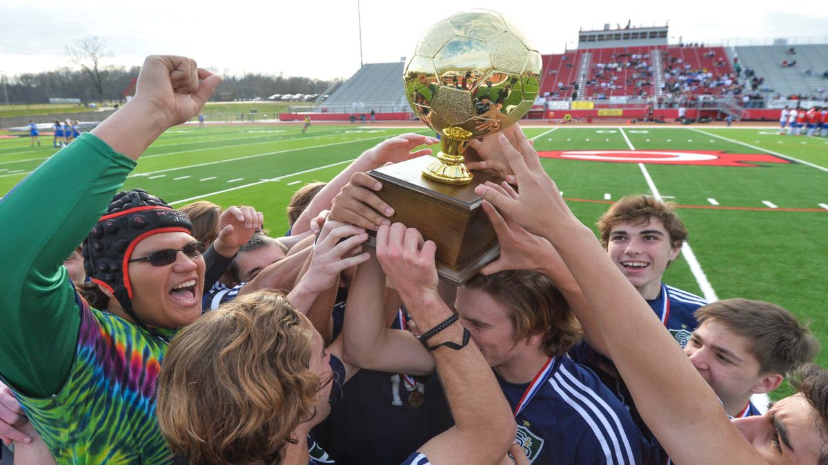 St. Patrick celebrates winning its second straight 1A-2A-3A state championship, beating Forest 4-0.