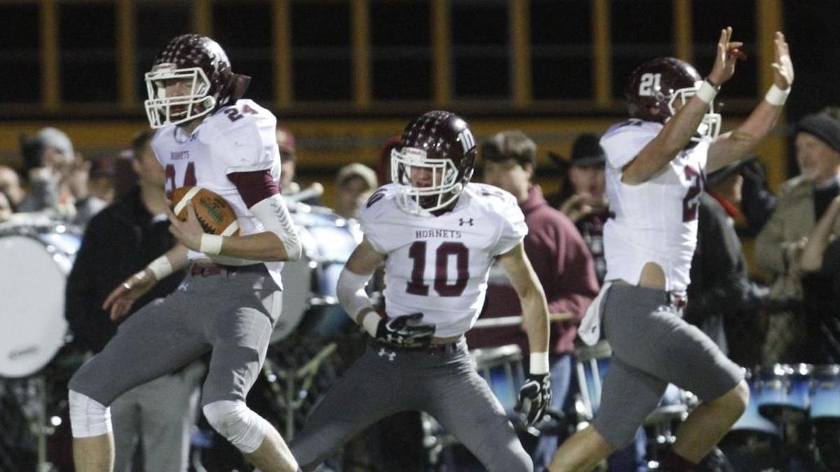 East Central players celebrate after linebacker Avery White, left, returned a fumble for a touchdown during the first quarter of their 4A South State championship game at Poplarville High School Stadium on Friday, Nov. 24, 2017.