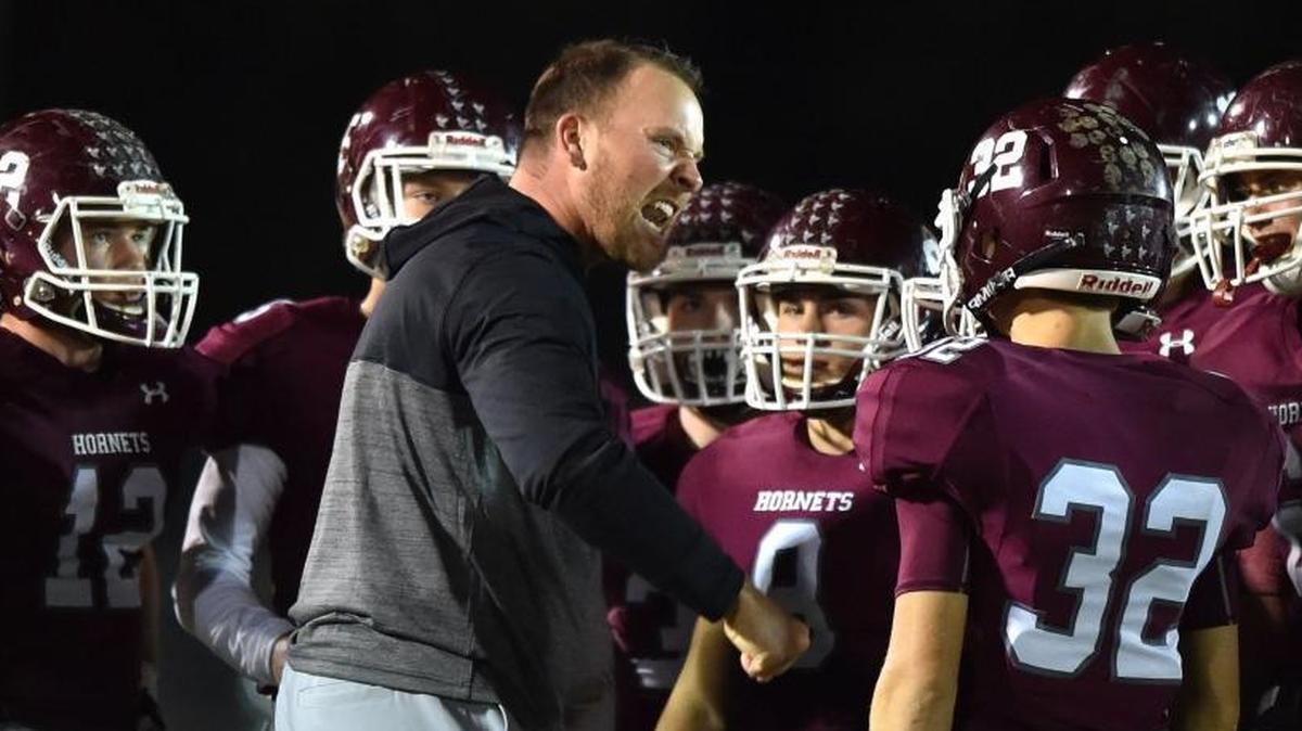 East Central head coach Seth Smith talks with his players during the second quarter against West Lauderdale on Nov. 10 in Hurley.