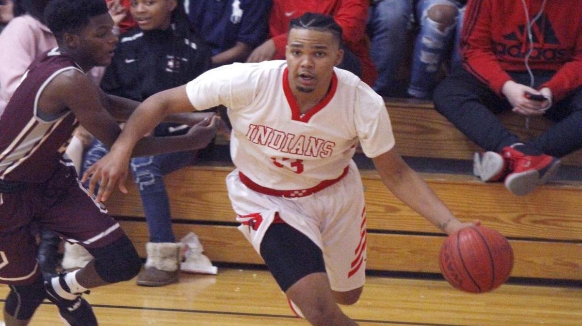 Biloxi's Fred Thompson drives the baseline against Long Beach on Dec. 2.