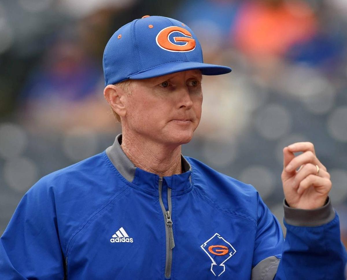 Gulfport head coach Jamie McMahon talks with an Admirals hitter on Saturday, May 20, 2017, in the MHSAA State Baseball Championships at Trustmark Park in Pearl.