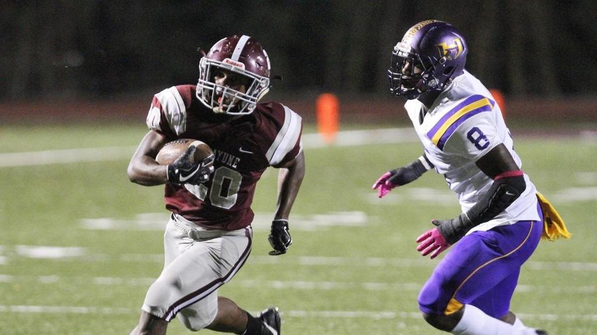 Picayune running back Shaun Anderson runs past Hattiesburg linebacker Dexter Gordon for a touchdown. Anderson was named the Region 4-5A player of the year.