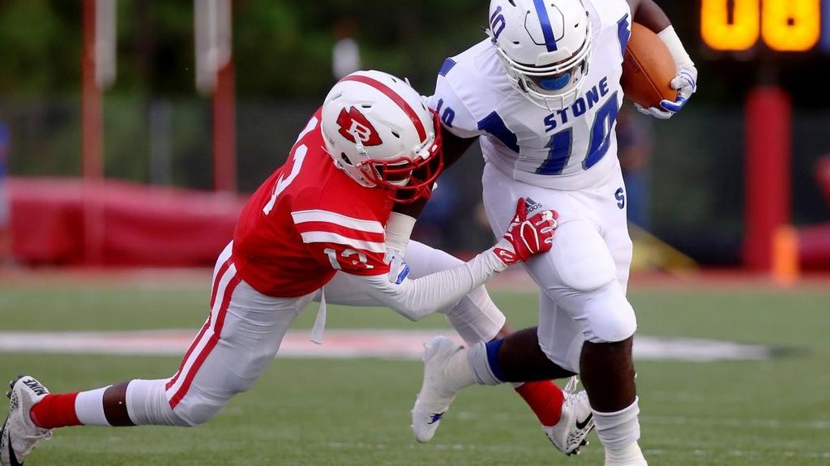 BIloxi's Mondre Stewart holds on to Stone County's Trey Arrington as he runs the ball on Friday, September 1, 2017, at Biloxi High. The Tomcats host Poplarville on Friday in Perkinston.