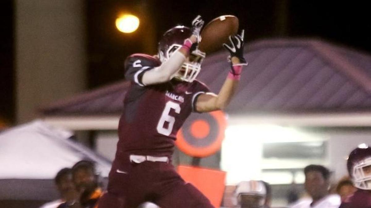 Long Beach's Charlie Wescovich makes the catch while in the air on Friday, October 6, 2017, at Long Beach High.