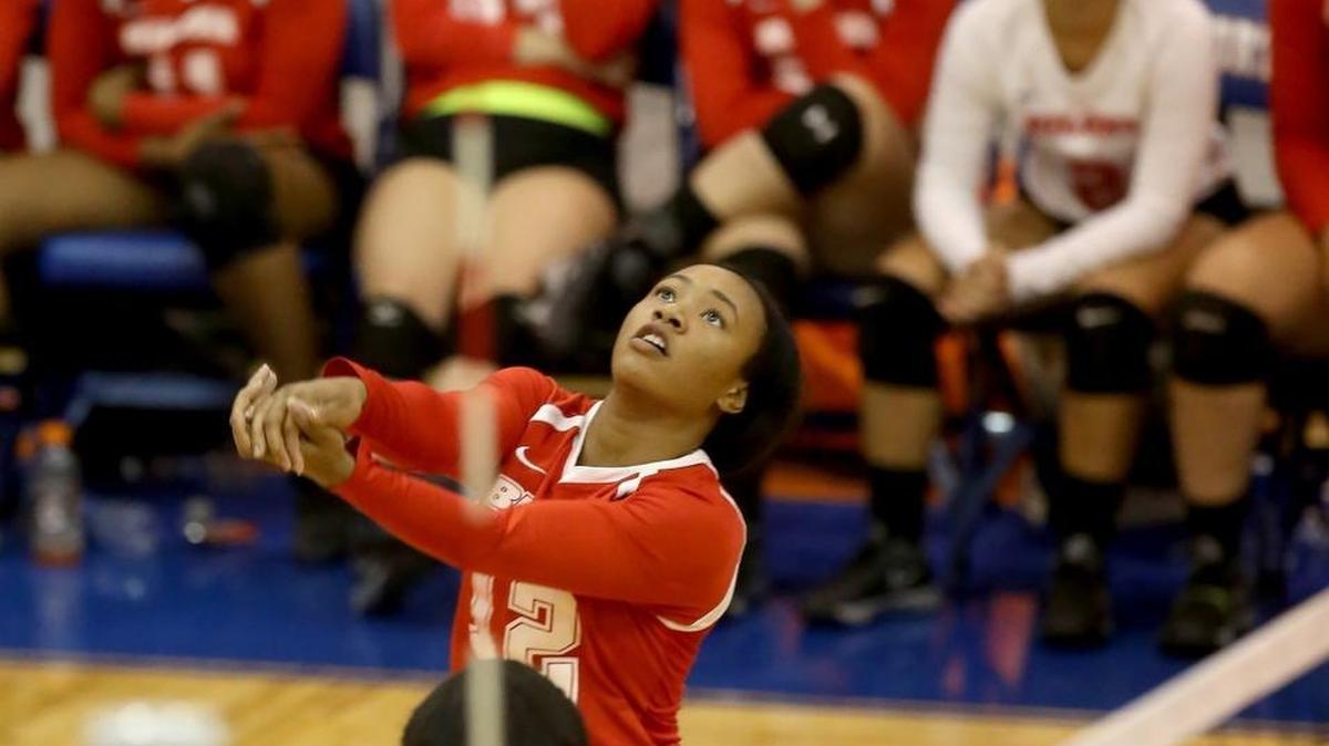 Biloxi's Samaya Ali hits the ball while competing against Gulfport on Tuesday, September 13, 2016, at Gulfport.