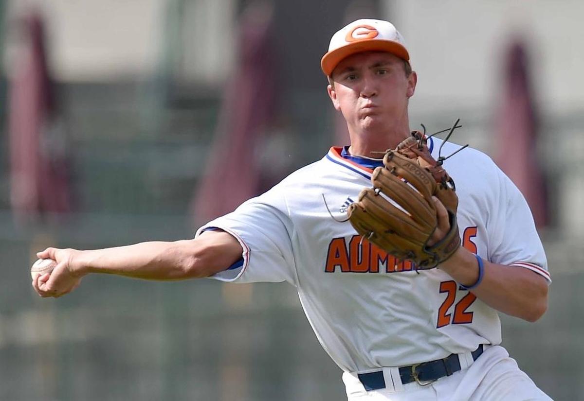 Gulfport shortstop Gabriel Lacy (22) throw out a Tupelo hitter on Thursday, May 18, 2017, in the MHSAA State Baseball Championships at Trustmark Park in Pearl.