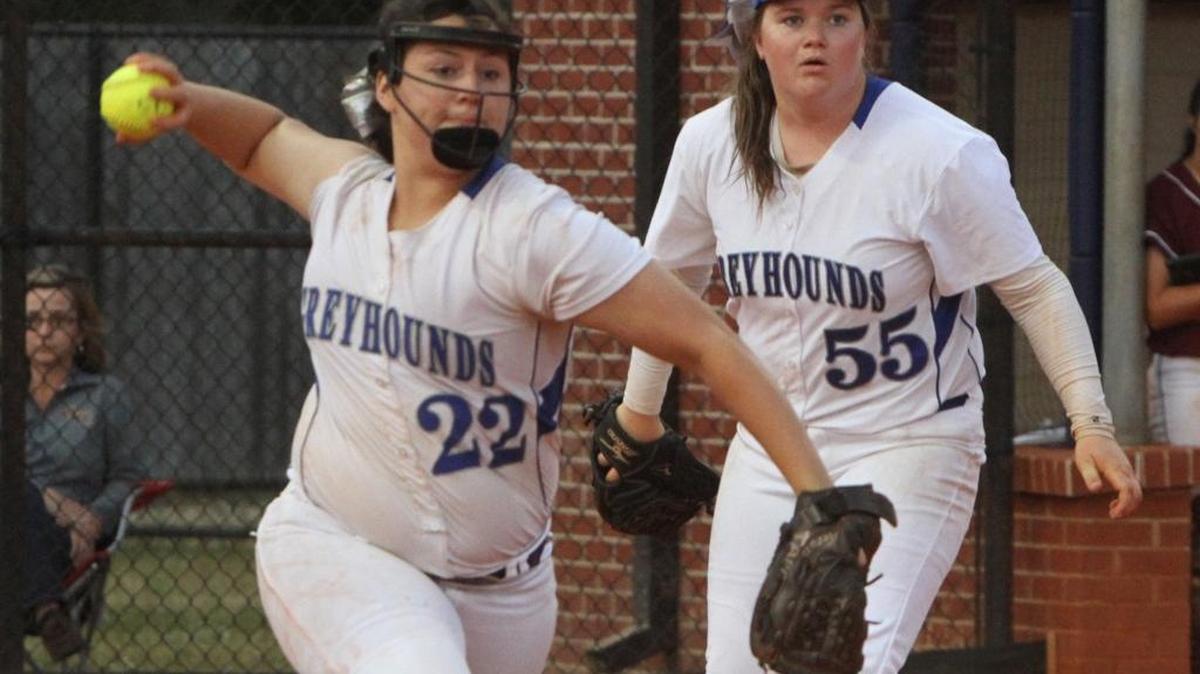 Ocean Springs pitcher Kylie Taylor watches as Aeryn Tapp throws to first during the first inning of their game against George County at Jack B. Hughes Field in Ocean Springs on Tuesday, April 11, 2017.