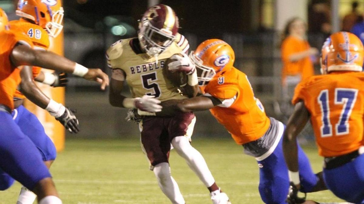 Gulfport linebacker Derick Hall hits George County running back Adonnis Dickey during the first quarter of their Port City Bowl Classic game at Milner Stadium on Gulfport on Friday, Aug. 18, 2017. Hall earned an offer from Mississippi State on Thursday.