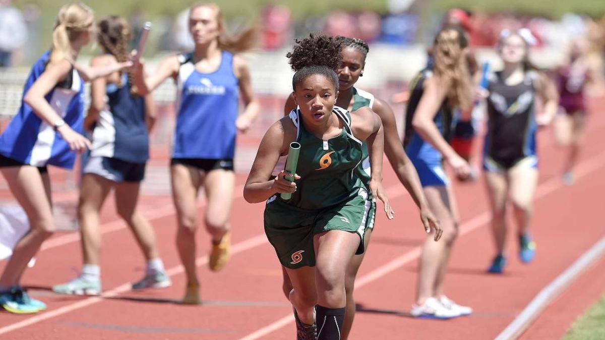 West Harrison runners make the baton exchange in the 4 x 800 meter relay on Friday, May 5, 2017, in the MHSAA Class 1A-3A-5A State Track Meet at Pearl High School in Pearl, Miss.
