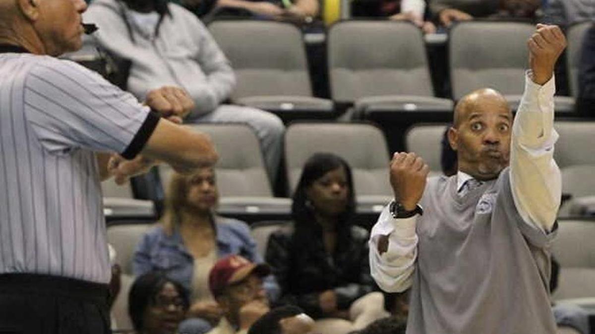 Moss Point coach Tony Woody celebrates a call during Hoopsfest at the Mississippi Coast Coliseum in Bilox in 2015.