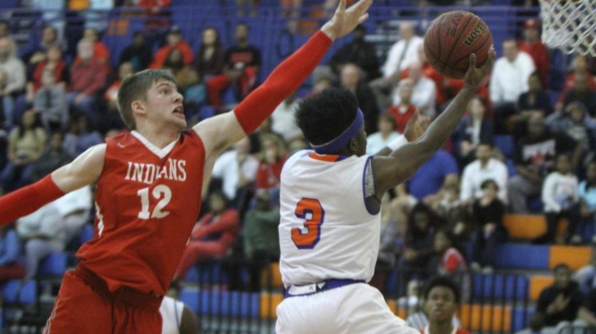 Biloxi's Mike Bumbridge guards Gulfport's Chad Crenshaw as he drives to the basket during the first quarter of their game at Bert Jenkins gym in Gulfport on Friday, Jan. 20, 2017.