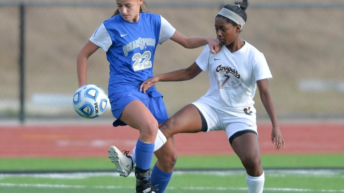 Northwest Rankin Alyssia Davis (7) works for a ball against Ocean Springs' Makenzie Ezell (22) during the 2017 6A Girls MHSAA Soccer Championships held at Clinton High School, Saturday Feb. 2, 2017.