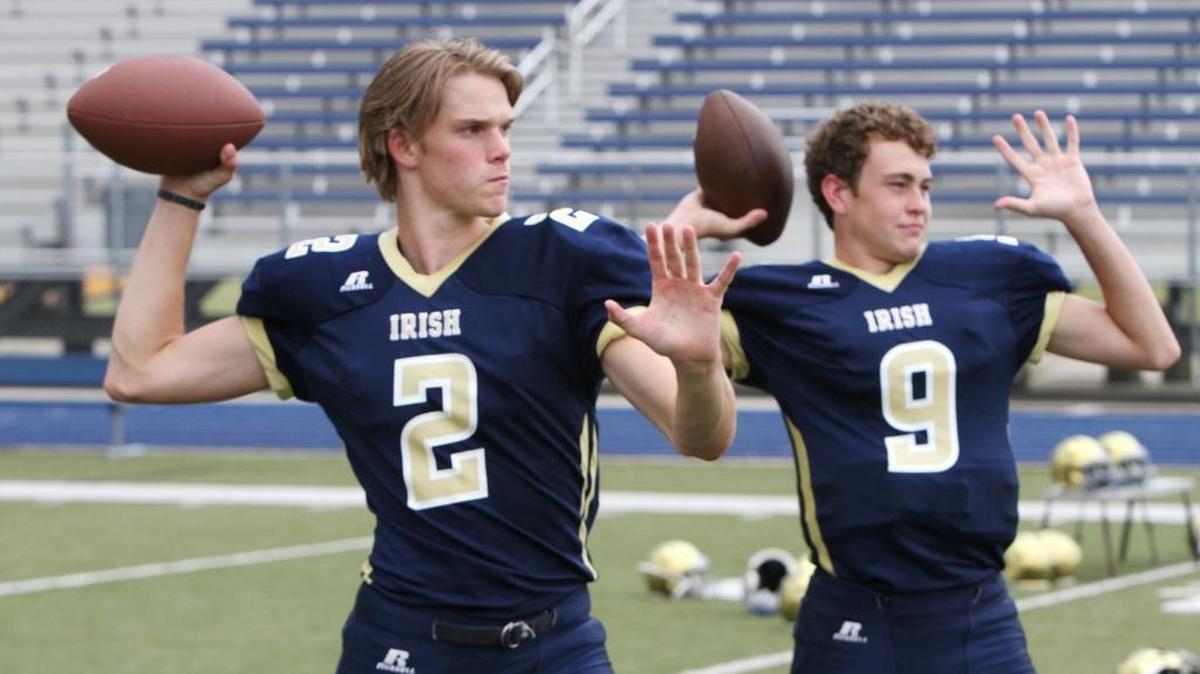 St. Patrick’s Jack Magandy, left, and Carson Bishop, and the rest of the Fighting Irish hosted Perry Central on Friday night.