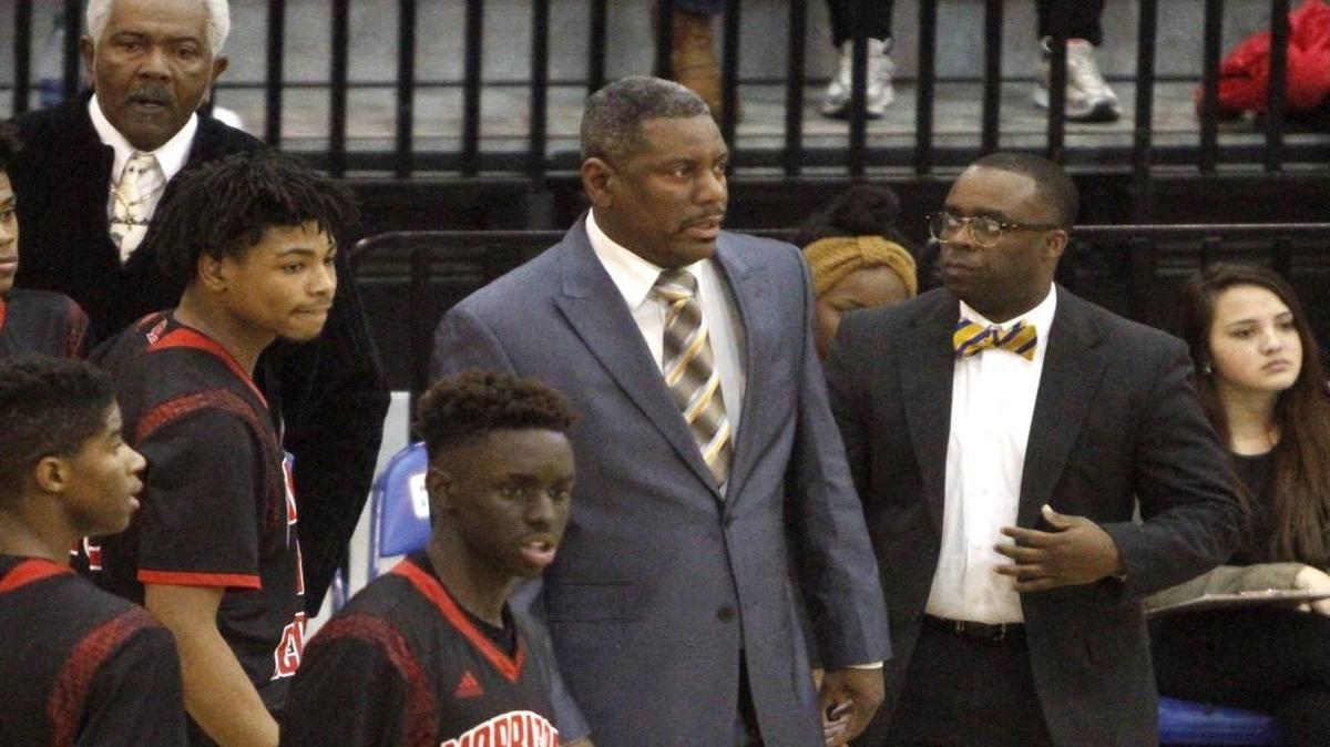 Harrison Central coach Boo Hardy rallies his team past Madison Ridgeland Academy on Saturday at HoopsFest.