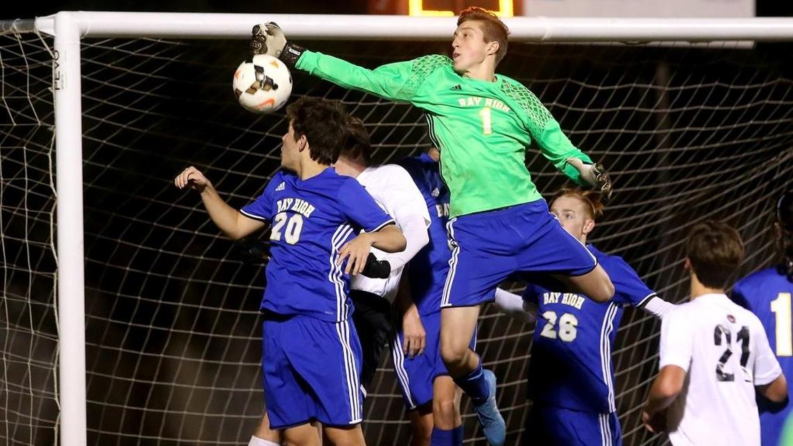 Bay High goalie John Bowman knocks the ball away from the net while competing against St. Stanislaus in the South State playoffs on Tuesday, January 31, 2017. Bowman was named to the Mississippi Coast Soccer All-Star game on Feb. 26 at Ocean Springs’ Greyhound Stadium.