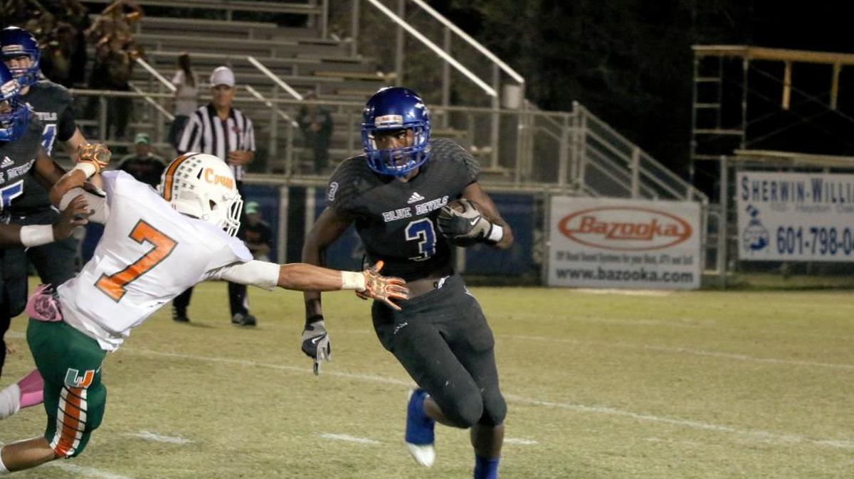PRC’s Diante Lenoir runs for a yardage gain during Friday’s game against Harrison Central.