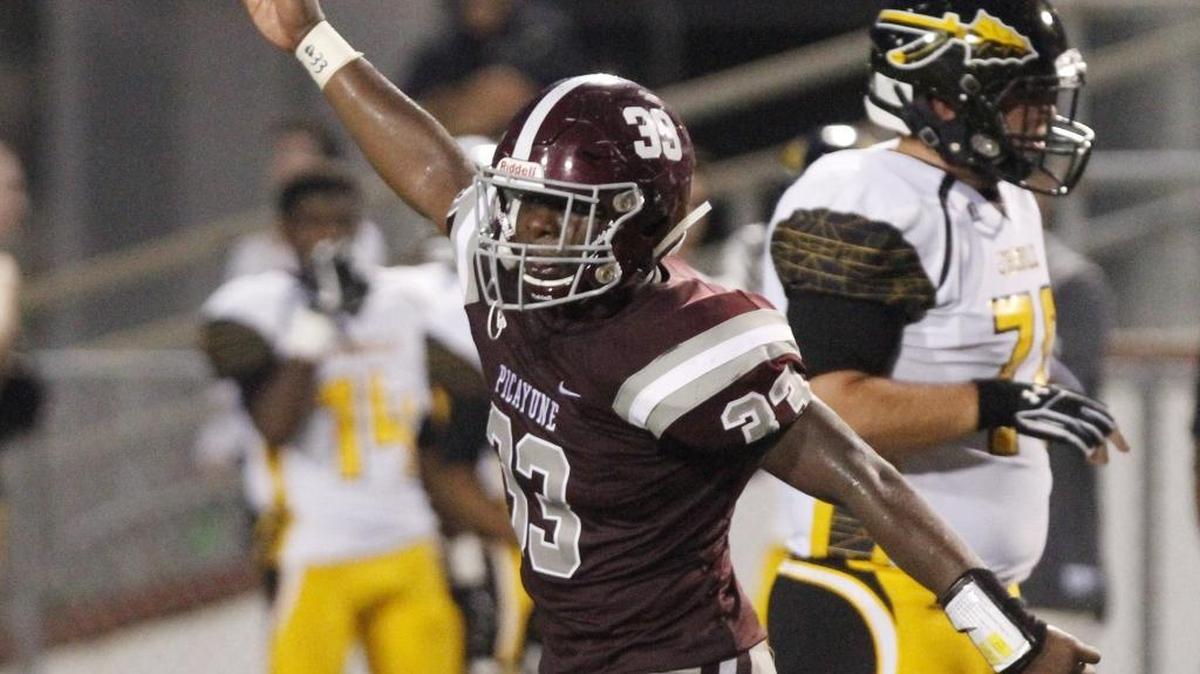 Picayune linebacker Brian Taylor celebrates a defensive stop against D'Iberville during the second quarter of their game at Lee/Triplett Stadium in Picayune on Friday.