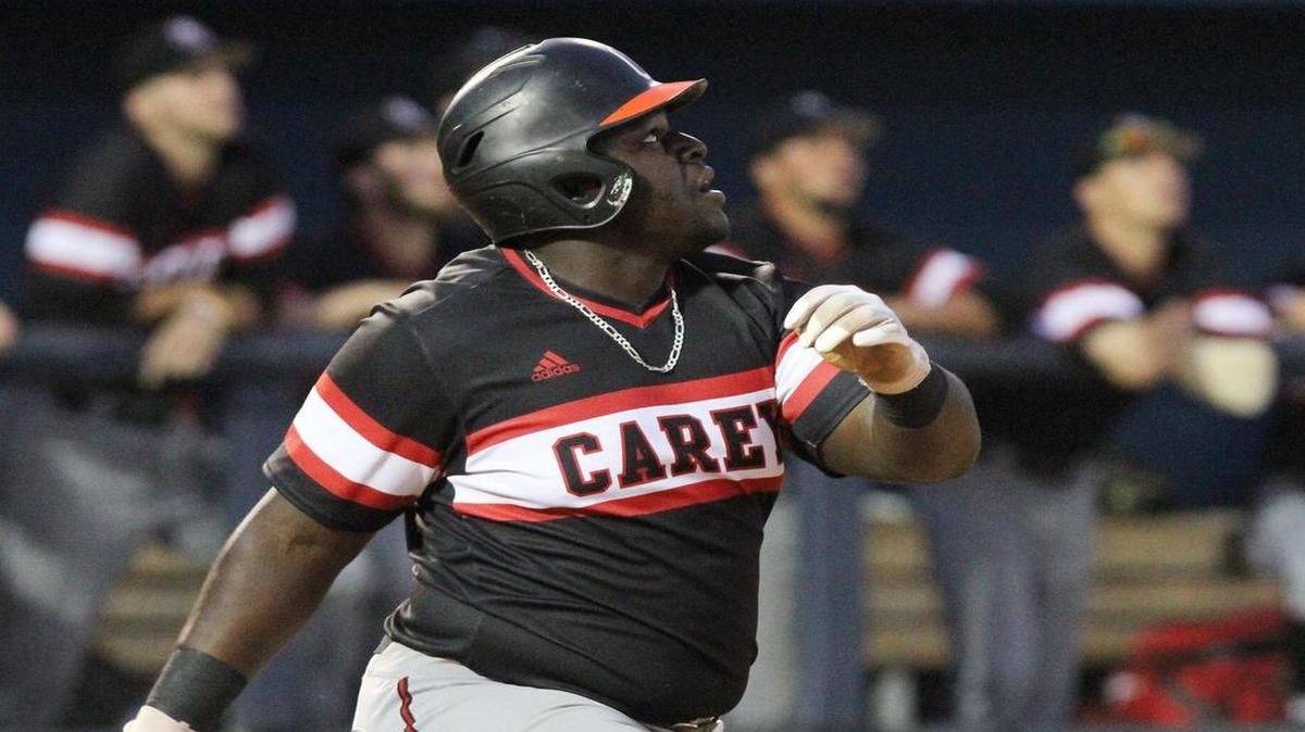 William Carey first baseman James Land hits a deep fly against the Biloxi Shuckers during the fourth inning of their exhibition game at MGM Park in Biloxi on April 4.