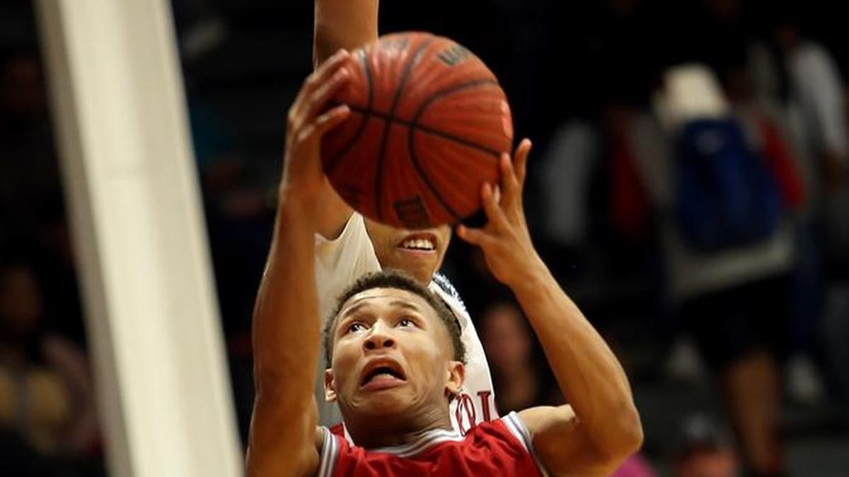 Biloxi's Dontavius Proby takes a shot while competing against Harrison Central.